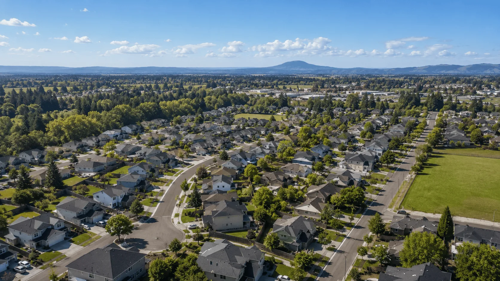 North Albany Oregon residential street showing newer homes near the Linn and Benton County boundary.